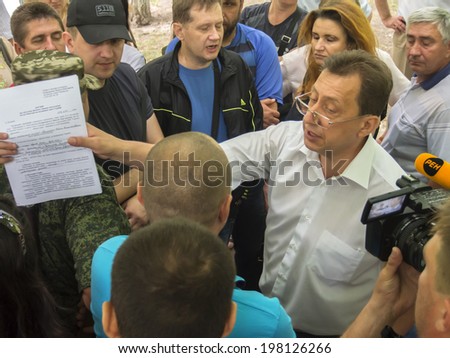 LUHANSK, UKRAINE - June 9, 2014: Parents of students of 1-2 courses of Lugansk State University of Internal Affairs require rector Vitaly Komarnicki not send cadets to practice in Odessa and Nikolaev.
