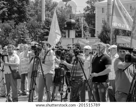 LUHANSK, UKRAINE - June 29, 2014:  Russian TV journalists on the rally