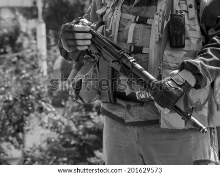 LUHANSK, UKRAINE - June 29, 2014: Armed representatives of private security company