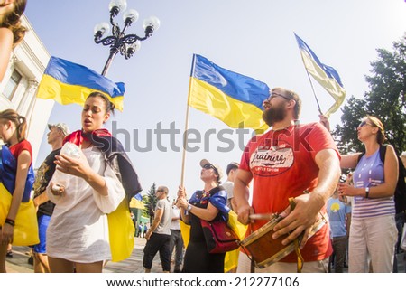 UKRAINE, KYIV - 14 Aug, 2014: Drummers set the rhythm of the protest. Protesters blocked the passage near the Ukrainian Parliament and surrounded almost the entire building.