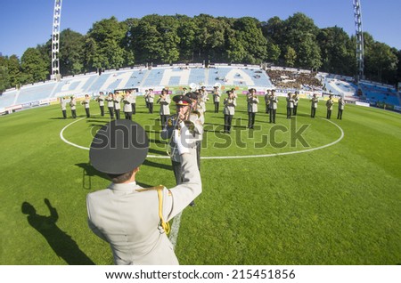UKRAINE, KYIV - September 6, 2014: Brass Band of the Ministry of Defence. --In a friendly match of pop stars, movies stars, businessmen,and members of the Military Forces of Ukraine