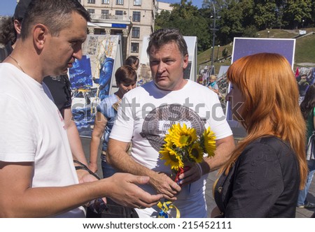 UKRAINE, KYIV - September 6, 2014: Gennady Balashov Party 5.10 leader  talking to voters on the Maidan in Kiev.