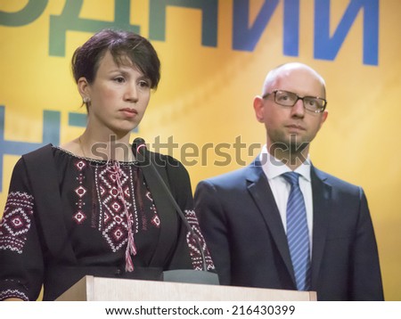 UKRAINE, KYIV - September 10, 2014: Social activist Tatyana Chornovil and Prime Minister Yatsenyuk. -- Prime Minister Yatsenyuk headed the newly formed political council of the People\'s Front.