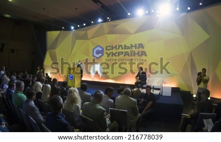 UKRAINE, KYIV - September 11, 2014: Delegates sit in the hall during the voting for the candidates of the People\'s Deputies of Ukraine from political party \