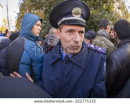 KIEV , UKRAINE - October 10, 2014: Police officers try to calm the activists before the passage of the Presidential Administration