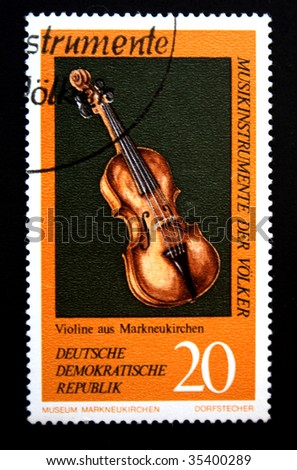 DDR - CIRCA 1970s: A stamp printed in the DDR (East Germany) shows a Violin from New Church of Mark, one stamp from series devoted Museum of national musical instruments, circa 1970s.