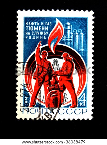USSR - CIRCA 1974: A stamp printed in USSR Shows two workers on a background of an oil derrick, the pipeline and an oil refining factory, have inscript cruid oil and natural gas of Tumen, circa 1974.