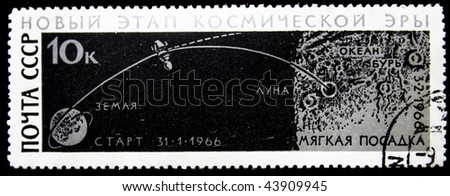 USSR - CIRCA 1966: A stamp printed in the USSR shows soft landing space satellite to the Moon, circa 1966