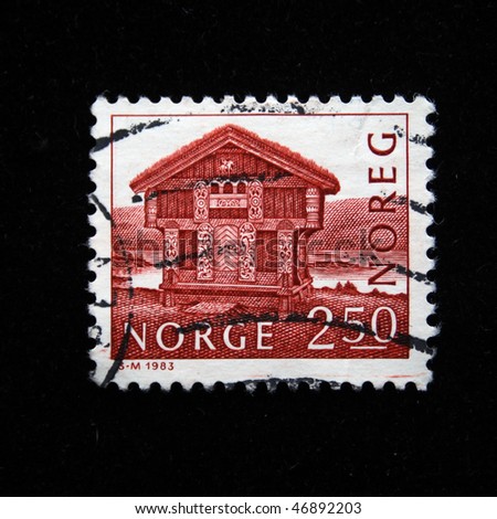NORWAY - CIRCA 1983: A stamp printed in Norway shows wooden log house built in 1975 in Breiland, circa 1983