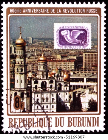 BURUNDI - CIRCA 1977: A post stamp printed in Burundi shows Soviet post stamp depicts  in the background of Ivan the Great Bell Tower in the Moscow Kremlin, circa 1977