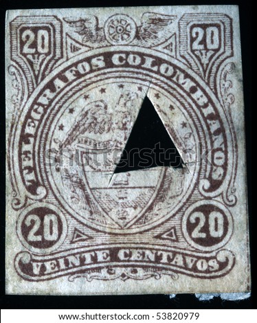 COLOMBIA - CIRCA 1900s: A telegraph stamps printed in Colombia, canceling was carried out by cutting out a hole puncher shows a coat of arms depicts a country, circa 1900s