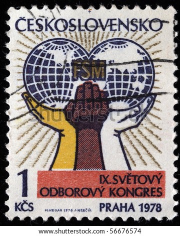 CZECHOSLOVAKIA - CIRCA 1978: A Stamp printed in Czechoslovakia shows Three hands holding globe, circa 1978