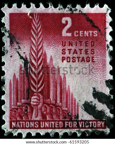 UNITED STATES OF AMERICA - CIRCA 1941: A stamp printed in the United States of America devoted United nations for defense under Hiltler, circa 1941