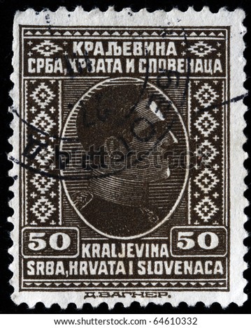 KINGDOM OF SERBIA, CROATIA AND SLAVONIA - CIRCA 1924: A stamp printed in Kingdom of Serbia, Croatia and Slavonia shows king Alexander I of Yugoslavia, circa 1924