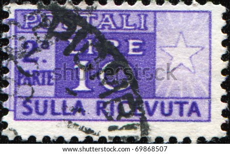 ITALY - CIRCA 1946:  Postage stamps for packets and parcels. Was released in Italy on 1946. This photo shows half affixed to the receipt, circa 1946