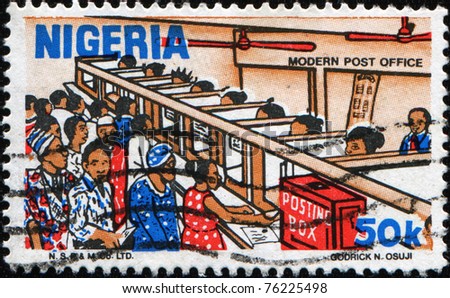 NIGERIA - CIRCA 1983: A stamp printed in Nigeria shows Nigerian Life. Post Office counter, circa 1983