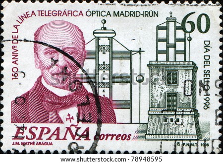 SPAIN - CIRCA 1996: A stamp printed in Spain shows Jose Mathe Aragua (General Director) and Telegraph Tower honoring  150th Anniversary of Madrid - Irun Telegraph Signal Line, circa 1996