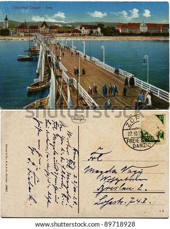 GERMANY - CIRCA 1929: A post card printed in Germany in Dresden shows Baltic Sopot, Bridge. Post card was sent from Free sity of Danzig, circa 1929