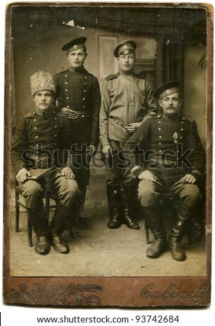 RUSSIA - CIRCA 1914 - 1917: An antique photo shows four soldiers, the Russian Empire,  period of the First World War