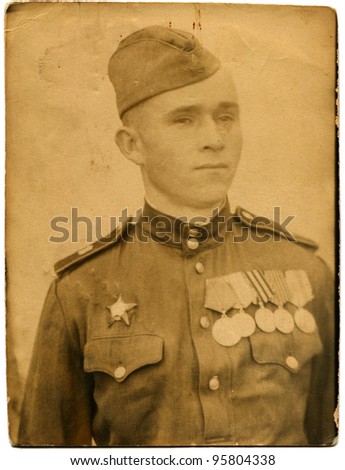 USSR - CIRCA 1944: Portrait of a Soviet Army soldier who was awarded the Order of the Red Star and five medals, Kirovograd, Ukraine, circa 1944
