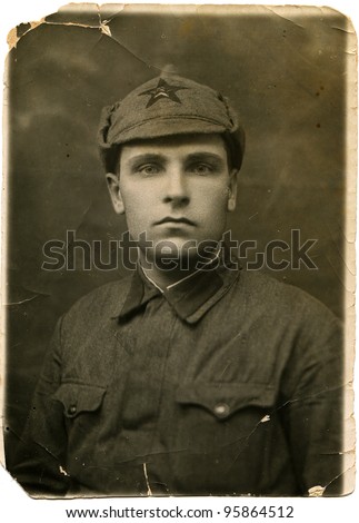 USSR - CIRCA 1930s: Portrait of a Red Army soldier in Budenovka, circa 1930s
