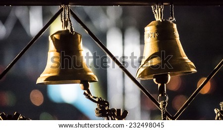 KIEV, UKRAINE - November 22, 2014: Ringing the bells near the Memorial to Victims of Holodomor in Ukraine. -  Ukrainian nation commemorates the victims of famines (Holodomors) and political repression