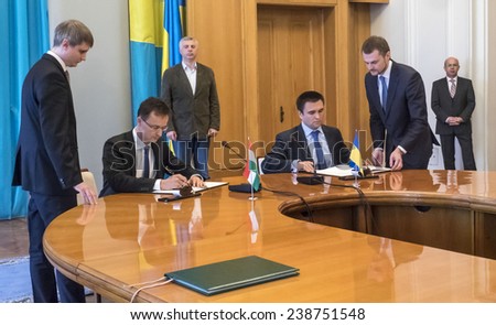 KIEV, UKRAINE - December 13, 2014:  Foreign Minister of Ukraine Pavlo Klimkin and Minister of Foreign Economy and Foreign Affairs of Hungary Peter Siyyarto