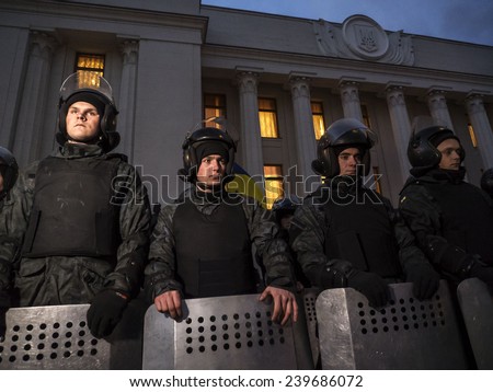 KIEV, UKRAINE - December 23, 2014: National Guard protects law and order near the Verkhovna Rada. -- To break through the cordon of police and four special forces in full uniform