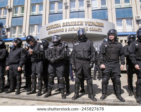 LUGANSK, UKRAINE - April 5, 2014: Ukrainian police against the building of the Security Service of Ukraine in Lugansk.
