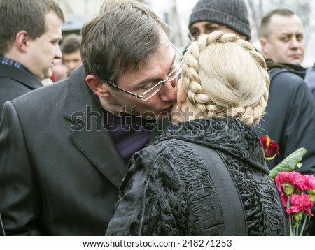 KIEV, UKRAINE - January 29, 2015: Leaders of political parties Block Yuriy Lutsenko Poroshenko welcomes Yulia Tymoshenko. Ukrainian politicinas attended the ceremony Kruty Heroes,