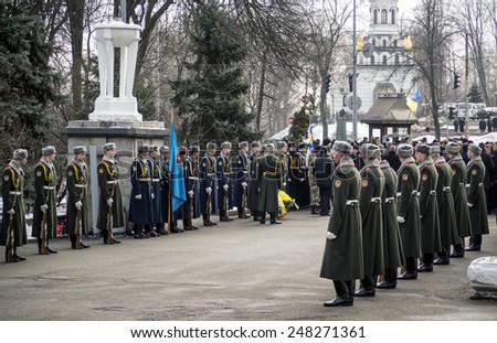 KIEV, UKRAINE - January 29, 2015: Politicians pass Guard of honor. Ukrainian politicinas attended ceremony Kruty Heroes, young guys who on this day in 1918 near the station Kruty in Chernihiv region