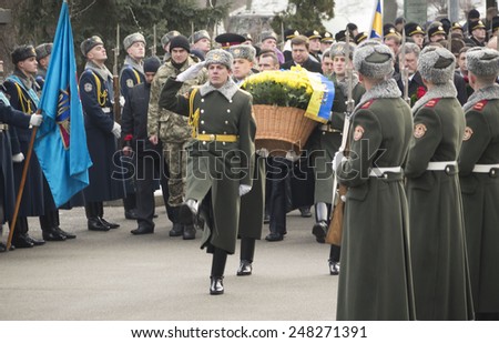 KIEV, UKRAINE - January 29, 2015: Politicians pass Guard of honor. Ukrainian politicinas attended ceremony Kruty Heroes, young guys who on this day in 1918 near the station Kruty in Chernihiv region