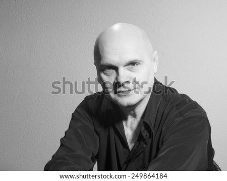 Studio black and white portrait portrait caucasian bald men. Emotions.