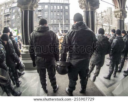 KIEV, UKRAINE - Feb 25, 2015: Police officers at the entrance to the National Bank. -- Activists of the \