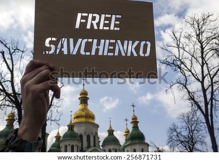 KIEV, UKRAINE - MARCH1m 2015: Banner with the inscription Free Savchenko on the background of the ancient church of St. Sophia Cathedral Ukraine.