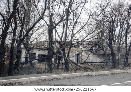DONETSK, UKRAINE - March 4, 2015: Destroyed houses in the area Putilovskaya Roshcha, Donetsk. -- This area is adjacent to the Donetsk airport named after Sergei Prokofiev.