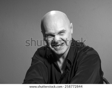 Studio black and white portrait caucasian bald men. Emotions. anger