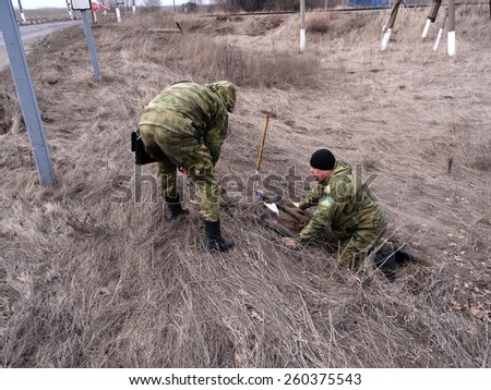 LISICHANSK, UKRAINE - March 12, 2015: Sappers have discovered an improvised explosive device -- Task Force Security Service of Ukraine together with the police prevented a terrorist act