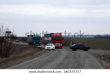 LISICHANSK, UKRAINE - March 12, 2015: Police blocked the passage to the danger zone -- Task Force Security Service of Ukraine together with the police prevented a terrorist act