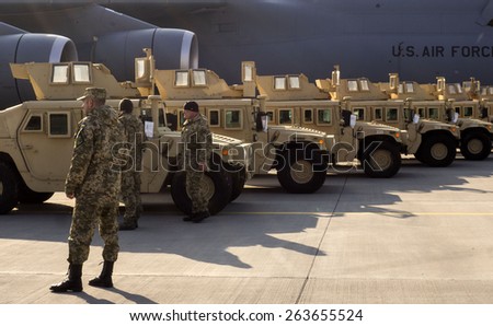 BORISPYL, KIEV, UKRAINE - MARCH 25, 2015: President Petro Poroshenko met military aircraft of the Air Force with the first batch of US armored vehicles at the international airport \