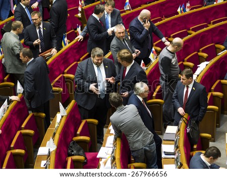KIEV, UKRAINE - April 9, 2015: MPs wait Polish President. -- President of Poland gave a speech in the Ukrainian parliament, the president of Petro Poroshenko and the Cabinet came to hear him.
