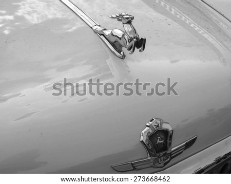 KIEV, UKRAINE - April 25, 2015: Deer emblem on the hood of the car \'\'Volga\'\' GAZ-21 The Retro OldCarFest is the biggest retro cars festival held in Kiev, and covers the State Aviation Museum grounds.