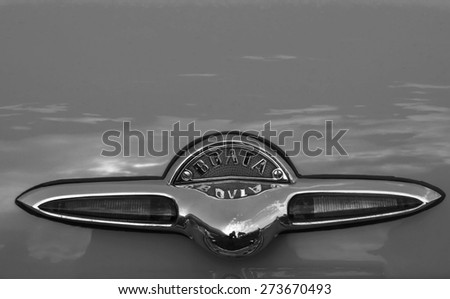 KIEV, UKRAINE - April 25, 2015: Emblem on the trunk of the car \'\'Volga\'\' GAZ-21 -- The Retro OldCarFest is the biggest retro cars festival held in Kiev, and covers the State Aviation Museum grounds.