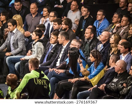 KIEV, UKRAINE - April 18, 2015: Peoples on the Fight between Ukrainian boxer Alexander Usyk from Klichko brothers company K2, who technical knockout of the Russian boxer defeated Andrei Knyazev