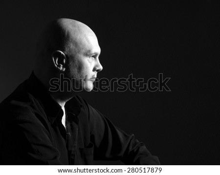 Studio portrait portrait caucasian bald men. Emotions. Serious