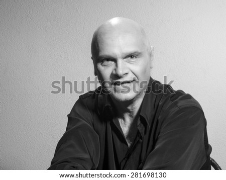 Studio portrait of caucasian bald men. Emotions. Open