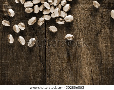 Kidney beans on wood table background. Protein nutrition.