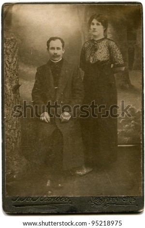 RUSSIA - CIRCA  the end of 19 - early 20 century: An antique photo shows  couple, Lugansk, Russian Empire Russian text: Umanskiy (photographer), Lugansk CIRCA  the end of 19 - early 20 century