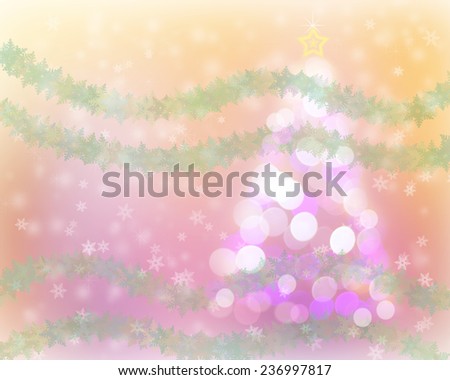 Defocused abstract christmas tree light bokeh and snow background with green snowflake garland.