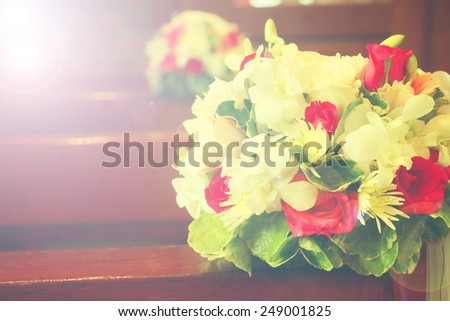 Beautiful flowers wedding decoration in church, process in vintage style.